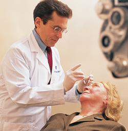 Philip J. Rosenfeld, MD, PhD, shown giving a patient an intravitreal injection